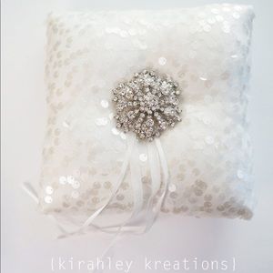 Snowflake brooch ring bearer pillow with blue ribbon